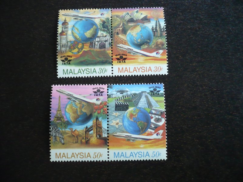 Stamps - Malaysia - Scott# 559a, 561a - Mint Hinged Pair of Stamps