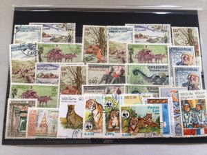 Laos duplicated used vintage stamps Ref 65795