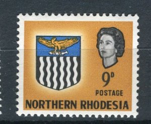 RHODESIA; NORTHERN 1963 early QEII COST OF ARMS issue mint hinged 9d. value