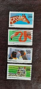 US Scott # 2705,2707-2709   4 used 29c Wild Animals issue, VF; off paper