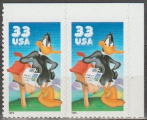 3307a, Pair(UR) W/ Wave Die Cut on back-side. Daffy Duck MNH, .33 cent.