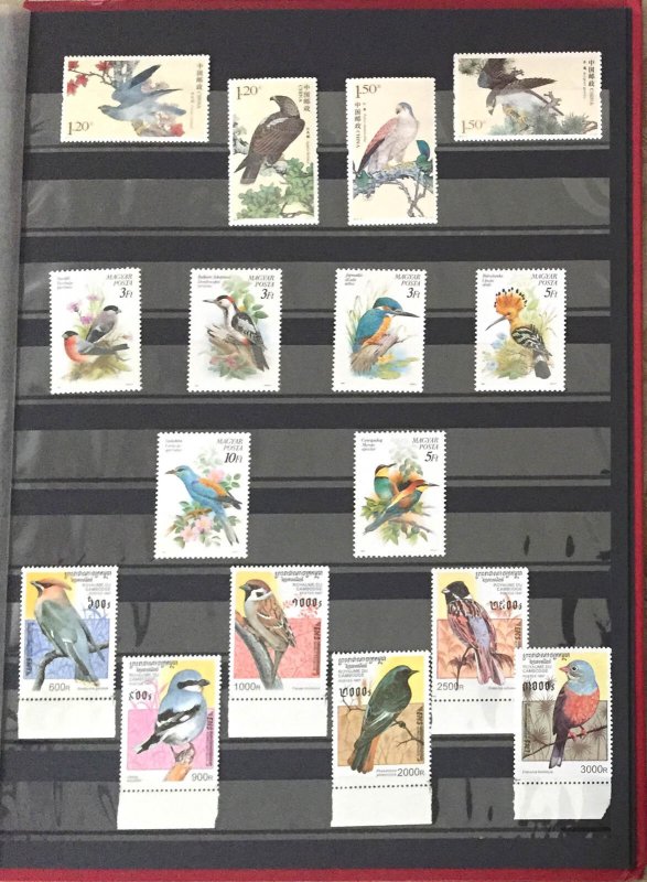 COLLECTION OF BIRDS MNH STAMPS FROM DIFF. COUNTRIES IN AN ALBUM - 210 STAMPS