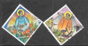 Zambia #645 & 64 Saints   (U)  CV$2.35