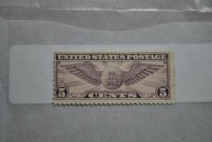 US C12 air mail stamp 5 cent winged globe unused