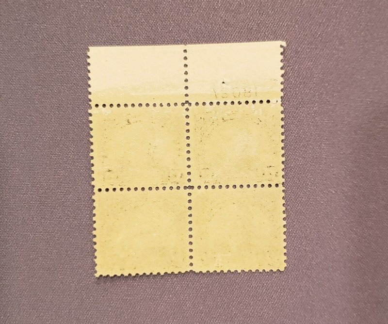 623,  Wilson, Unused, Block of 4 w/plate #, crease, small gum skips, CV $105.00