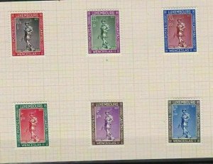 LUXEMBOURG 1937 CHARITY STAMPS SET MOUNTED MINT ON PIECE  . REF R 2551