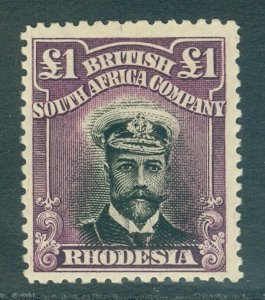 SG 242 Rhodesia £1 black & reddish purple. A pristine very lightly mounted...