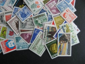 Canada 100 different MNH mostly older stamps, check this group out!