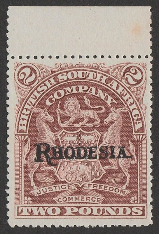 RHODESIA 1909 'RHODESIA' on Arms £2 rosy-brown bluish paper. Rare MNH **.