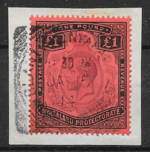 NYASALAND SG98 1913 £1 PURPLE & BLACK ON RED USED ON PIECE (s)