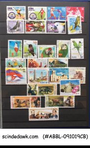 COLLECTION OF CUBA STAMPS IN AN ALBUM