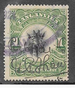 Tanganyika  #23 1sh green & black Giraffe (U) CV $12.50