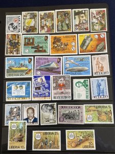 Liberia 45 MNH Stamps and Souvenir Sheets in Complete Sets