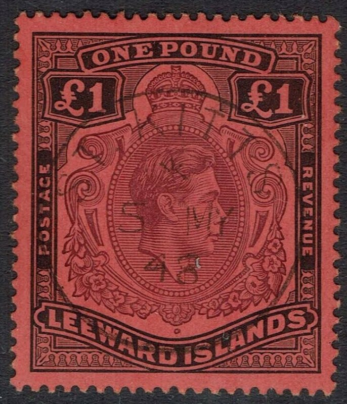 LEEWARD ISLANDS 1938 KGVI 1 POUND PURPLE AND BLACK ON CARMINE PERF 14 USED 