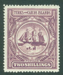 SG 108 Turks & Caicos 2/- purple. Lightly mounted mint CAT £60 
