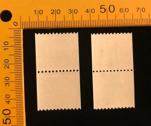 1054A Pair with large holes, MNH