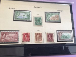 Jamaica mint never hinged and used stamps on part album page Ref 61786