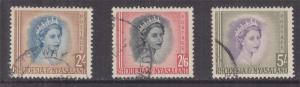 RHODESIA & NYASALAND, 1954 QE 2s., 2s.6 & 5s., used.