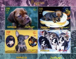 Somalia 2004 Dogs Puppies sheet (4) Perforated mnh.vf