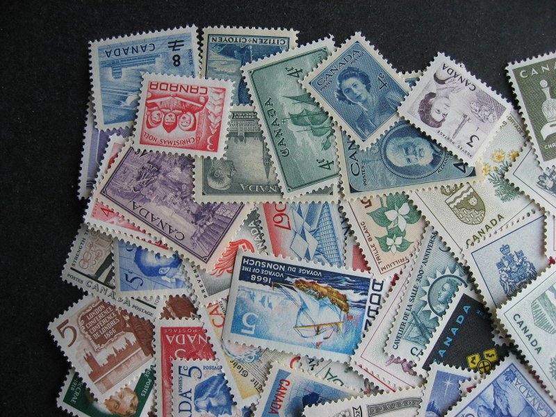 Canada 100 different MNH mostly older stamps, check this group out!