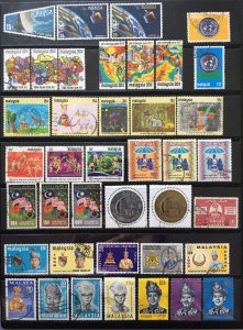 MALAYSIA 1953-73 - 18 sets of issues Used (stockcard not included) GM1011