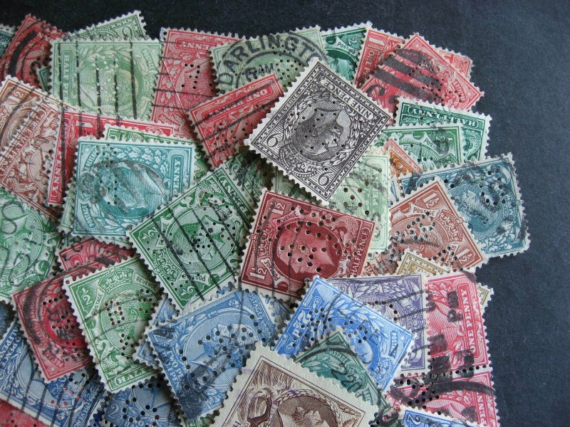 Great Britain 100 perfins mostly KEVII, KGV era mixture(duplicates,mixed cond) 