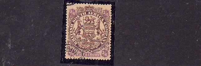 Rhodesia-Sc#35-used-2sh6p brn & vio,yel-Coat of Arms-1896-