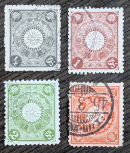 Japan, Scott #92-94, 105. Used, hinged or previously hinged.