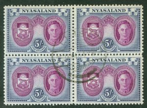 SG 155 Nyasaland 1945. 5/- purple & blue. Very fine used block of 4