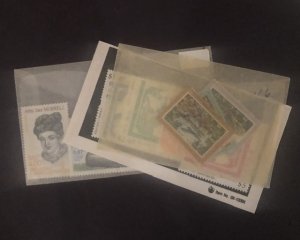 Lot of International Stamps In Glass Scenes Some Have Nice Value