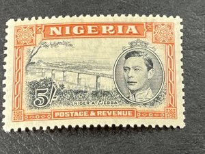 NIGERIA # 64c-MINT/HINGED(LIGHTLY TONED GUM)----SINGLE---PERF 13 x 11 1/2---1938
