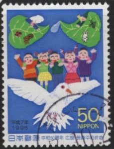 Japan 2489 (used) 50y end of World War II: people on wings of dove (1995)