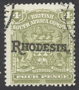 Rhodesia Sc# 87 Used 1909 4p overprints Coat of Arms