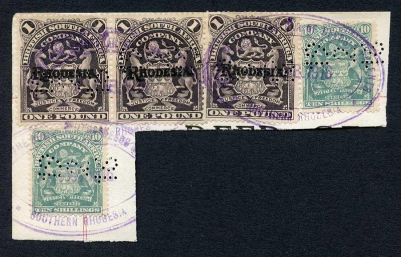 Rhodesia SG113 One Pound Strip and 10/- x 2 Fiscally used on piece 