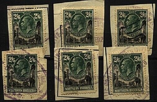 NORTHERN RHODESIA 1925 GV 2/6d SG12 x 6 fiscally used on pieces...........98527