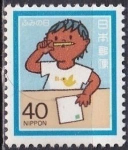 Japan 1531 (mnh) 40y Letter Writing Day: boy with pencil & letter (1983)