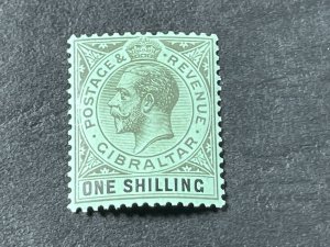 GIBRALTAR # 83-MINT/HINGED---SINGLE---BLACK ON EMERALD PAPER---1921-32