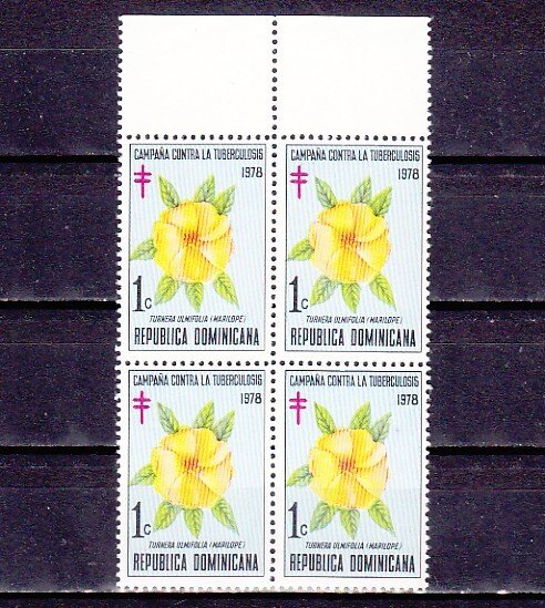 Dominican Rep., Scott cat. RA84. T-B issue, Flower shown. Block of 4. ^