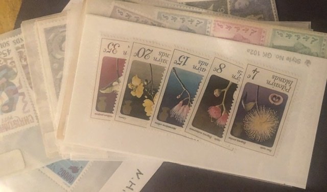 Lot of International Stamps In Glass Scenes Some Have Nice Value