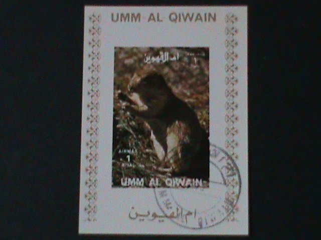 ​UMM AL QIWAIN- LOVELY PROTECTING ANIMAL-CTO IMPERF-S/S VF-FANCY CANCEL