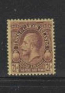 TURKS & CAICOS ISLANDS #64 1928 2 1/2p KING GEORGE V MINT VF LH O.G