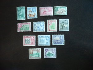 Stamps - Fiji - Scott#117-122,124,127,128-131 - Used & MH Part Set of 13 Stamps