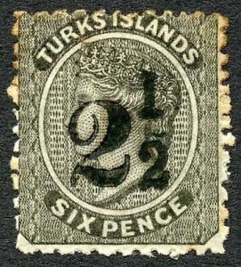 Turks and Caicos SG28 2 1/2d on 6d Black M/M (toned) Cat 250 pounds