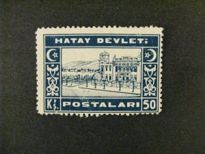 Hatay #24 MNH lightly toned perf at bottom a21.9 3182