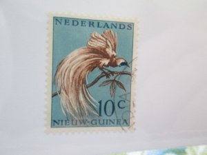 Netherlands New Guinea #25 used  2024 SCV = $0.25