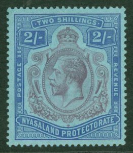 SG 109g Nyasaland 1921-33. 2/- purple & blue/grey-blue. Very lightly mounted...