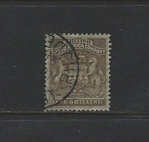 RHODESIA - #9 - 1SH COAT OF ARMS USED STAMP (1892)