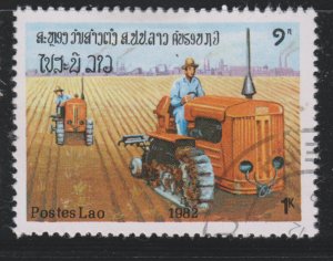 Laos 420 Tractors. field, industry 1982