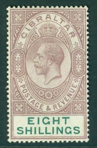 SG 101 Gibraltar 1921-27. 8/- dull purple & green. A pristine very lightly...