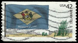 # 4282 USED DELAWARE FLAG AND BEACH